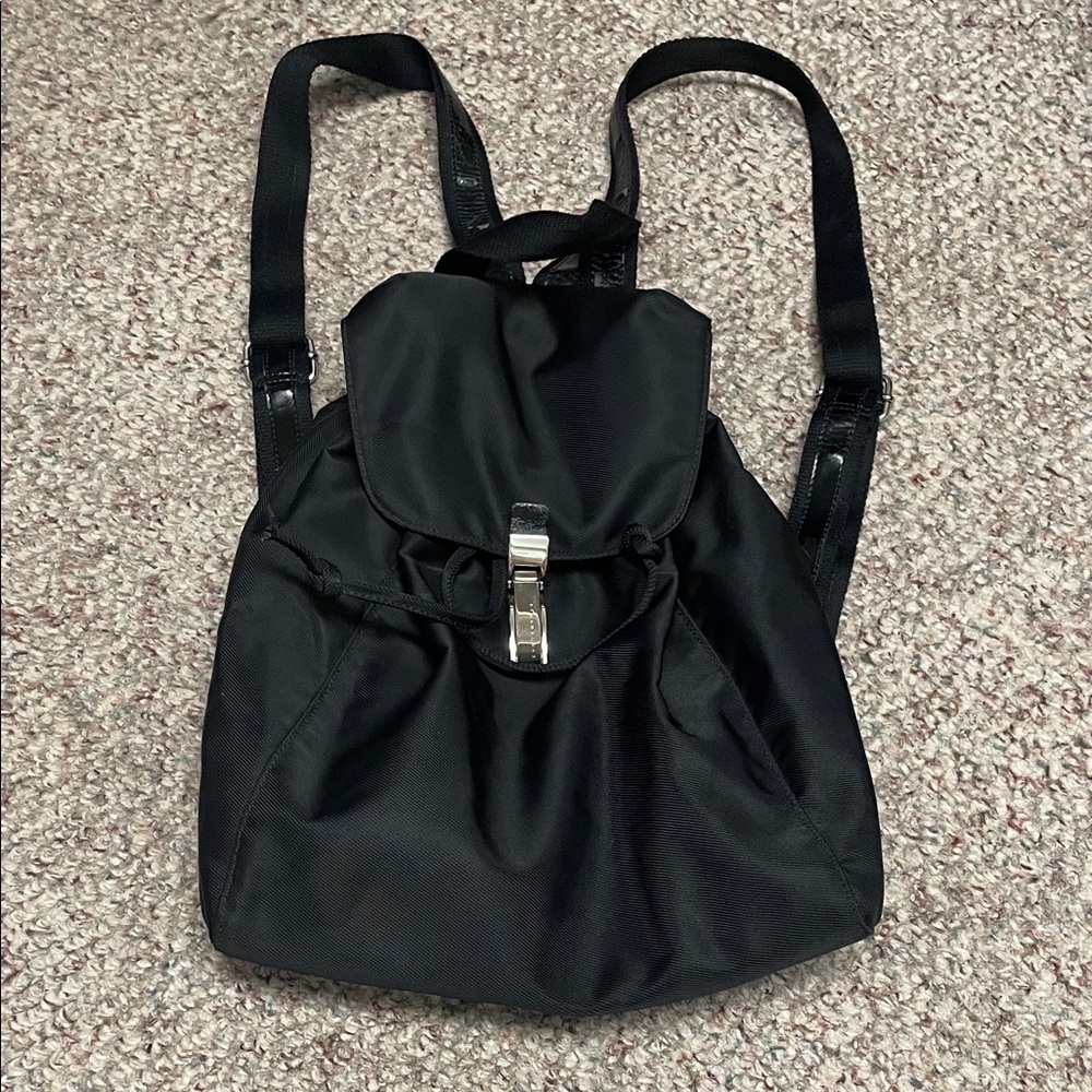 Coccinelle Leather and nylon Black Backpack with logo silver clasp